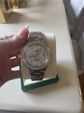 Rolex Silver Mother-of-Pearl Dial Watch with Diamond Bezel
